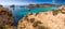 Comino, Malta - The beautiful Blue Lagoon with turquoise clear sea water, yachts and snorkeling tourists