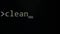 Command line with word Clean typed on computer screen closeup . Macro detail shot monitor pixels. Pixels zoomed in with