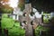 Commemorating their memory with a cross. a gravestone in a cemetery.