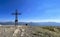 commemorative cross Mount Ventasso Reggio Emilia, in August with low water