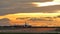 Commercial Aircraft Landing at Barcelona Airport at Sunset