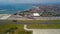 Commercial aircraft taxi on the runway at Denpasar Airport in Bali, Indonesia. Drone view of a big jet preparing to take