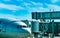 Commercial airline parked at jet bridge for passenger take off at the airport. Aircraft passenger boarding bridge docked with blue