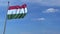 Commercial airplane landing behind waving Hungarian flag. Travel to Hungary conceptual animation