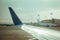 Commercial airplane wing and other commercial airplanes near terminal 3 at Ben Gurion international airport