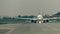 Commercial airplanes taxiing at international airport, front view