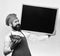 Commercial cooking service concept. Man with beard on white background. Chef holds bowl with potato casserole and board