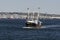 Commercial fishing boat Frontier crossing New Bedford inner harbor