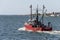 Commercial fishing boat Hunter crossing New Bedford outer harbor