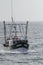 Commercial fishing boat Pilgrim coming out of Buzzards Bay