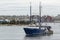 Commercial fishing vessel Lady Roslyn leaving New Bedford