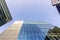 Commercial glass buildings with sky. Up view in Manhattan, New York City