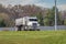 Commercial Heavy Dump Truck Exits Freeway