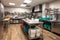commercial kitchen, with bins and buckets of cleaning supplies at the ready