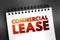 Commercial Lease text on notepad, concept background