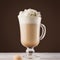 Commercial license  Title  Morning cappuccino coffee in exquisite transparent glass with whipped cream, cookies in dark brown.