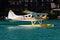 Commercial  seaplane at lake. Small and sport aircraft. General aviation industry. Vip transport. Civil utility transportation.