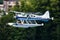 Commercial  seaplane at lake. Small and sport aircraft. General aviation industry. Vip transport. Civil utility transportation.