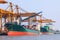 commercial ship with container on shipping port for import export and logistic transportation