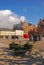 Commercial shops, restaurants & old historical buildings & pots of flowers in town centre of Big Square Stortorget, Malmo, Sweden