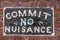 Commit No Nuisance sign in Chinatown, Melbourne, Australia