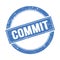 COMMIT text on blue grungy round stamp