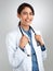 Committed to providing you with exceptional care. Studio portrait of a confident young doctor posing against a grey
