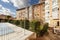 Common areas with a pool covered by a canvas in an urbanization with hedges and gardens