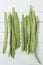 Common beans on a white wooden background