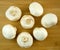 Common mushrooms on cutting board