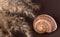 Common reed phragmites snail shell on background. Dried flowers for decoration.