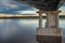 Common river bridge at cloudy day