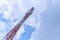 Communication signal tower with blue sky