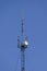 Communication tower with repeaters and satellite dish