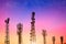 Communication towers on dusk sky, powering 4G and 5G networks. variety network cell site silhouette against vibrant morning sky