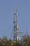 Communications tower gainst a blue sky backdrop