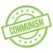 COMMUNISM text written on green vintage stamp