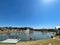 Community fishing event near floating dock at neighborhood pond during sunny Spring day in Southlake, Texas, America