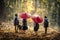 Community life. The boy and girl holding a red umbrella with dog is walking in the forest to go to school. Group of school boys