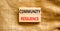 Community resilience symbol. Concept word Community resilience typed on wooden blocks. Beautiful canvas table canvas background.