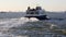 Commuter ferry boat CONNECTOR leaving Brooklyn Army Terminal pier, rear view, New York, NY