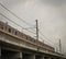 A commuter line passing trough an overpass photo taken in Jakarta Indonesia