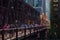 Commuters rush along the Lake Street bridge with elevated train track structure over Chicago River