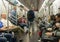 Commuters travelling in a subway train in New York City