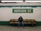 Commuters waiting at the Bergen Street Subway Station in Brooklyn, New York along the F line