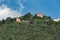 Como, ITALY - August 4, 2019: Apartments, villas, hotels on the green forested mountainsides near Lake Como. Beautiful Italian