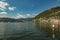 Como, ITALY - August 4, 2019: Apartments, villas, hotels on the green forested mountainsides near Lake Como. Beautiful Italian