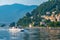 COMO, ITALY, JULY 18, 2019: Ferry cruising lake Como in Italy