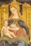 COMO, ITALY - MAY 8, 2015: The detail of fresco of Madonna in church Basilica di San Fedele by Andreas de Magistris 1504