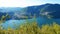 Como Lake landscape. Cernobbio village, trees, water and mountains. Italy, Europe